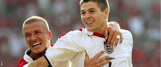 David Beckham and Steven Gerrard celebrate the Liverpool player's goal during England's Euro 2004 Group B victory over Switzerland in Coimbra, Portugal