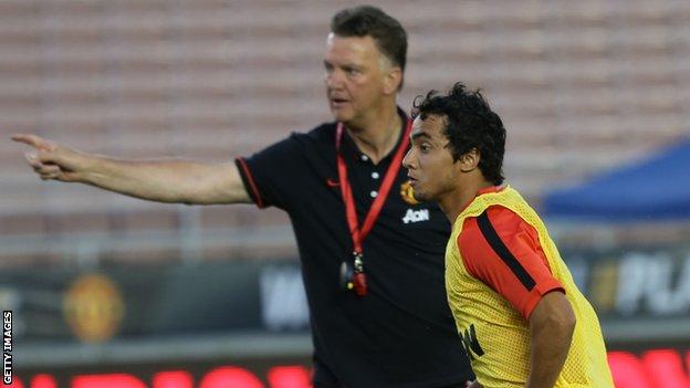 Manchester United manager Louis Van Gaal (left) and defender Rafael