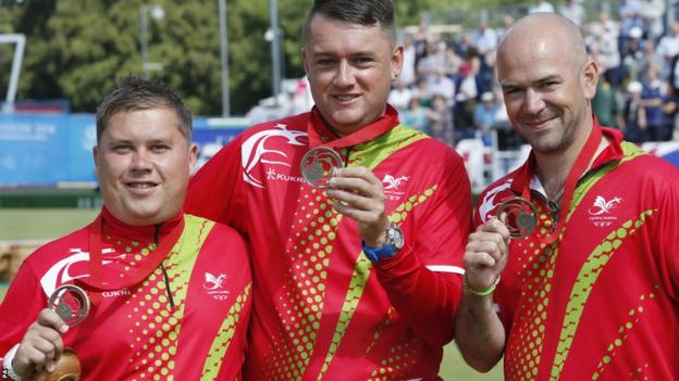 Lawn bowlers Paul Taylor, Jonathan Tomlinson and Marc Wyatt won bronze in the men's triples