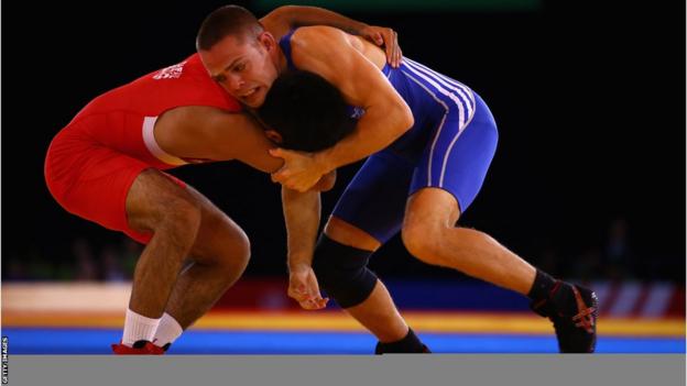 Craig Pilling beat Omar Tafail of England 8-5 in the men's freestyle 57kg category to secure bronze - Wales' first ever medal in wrestling.