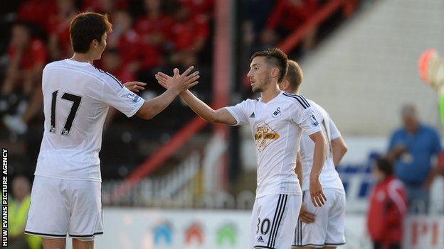 Josh Sheehan celebrates scoring for Swansea City