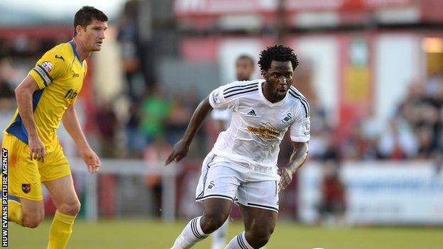 Swansea City striker Wilfried Bony in action against Exeter City
