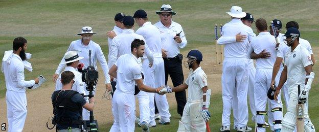 Players shake hands after England's win