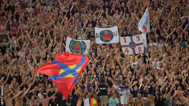 Steaua Bucharest punished by Uefa after racist behaviour by fans, Steaua  Bucharest