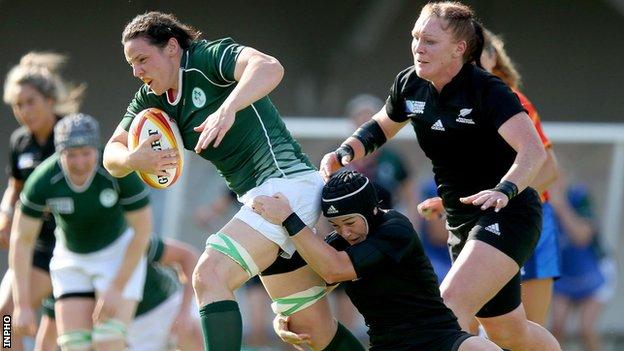 Ireland's Paula Fitzpatrick is tackled by Emma Jensen of New Zealand