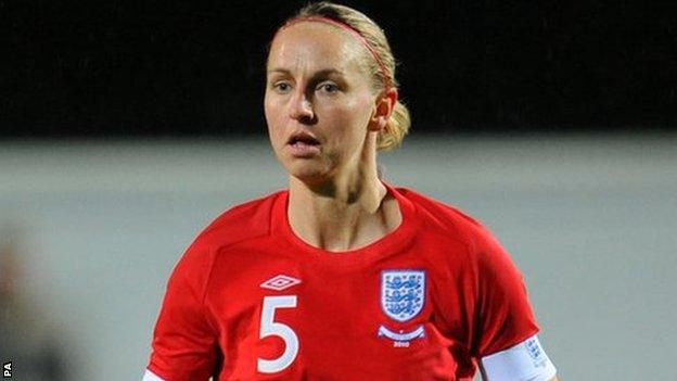 Former England captain Faye White in action