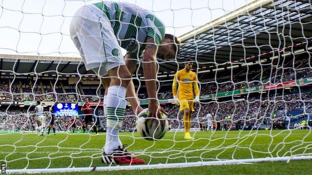 Mikel Lustig retrieves the ball as Celtic fall behind to Legia Warsaw
