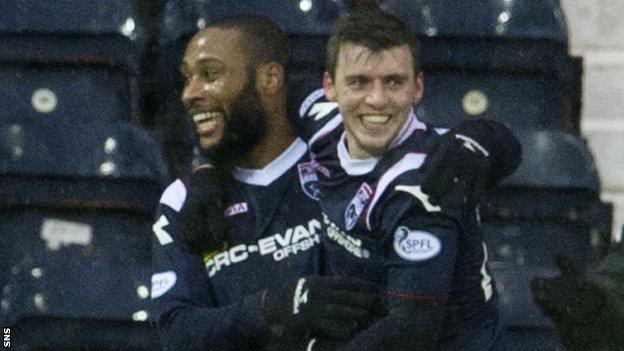Ross County forwards Yoann Arquin and Graham Carey