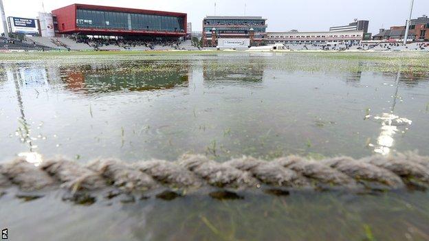 Rain on the outfield at Old Trafford