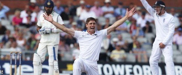 England's Chris Woakes celebrates another wicket