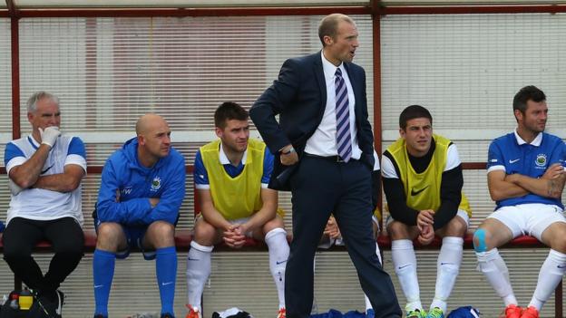 Warren Feeney endured a disappointing first league match as Linfield manager as last season's Premiership runners-up crashed to a 3-0 defeat at Portadown