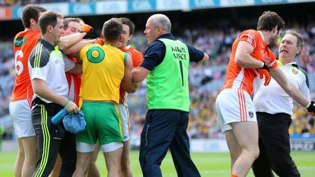 A scuffle breaks out between players and officials during the quarter-final between Ulster rivals Armagh and Donegal at Croke Park in Dublin