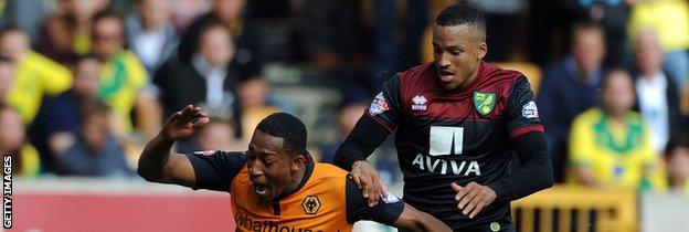 Martin Olsson tangles with Wolves' Rajiv van La Parra before being sent off