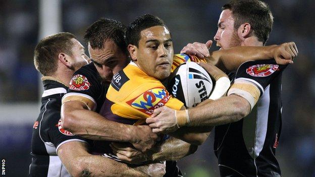 Ben Te'o is tackled while in action for the Brisbane Broncos aganst the Warriors in 2010
