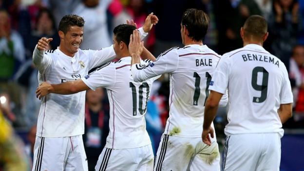 Ronaldo is congratulated by team-mates James Rodriguez, Bale and Karim Benzema.