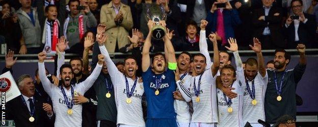 Real celebrate with Super Cup trophy