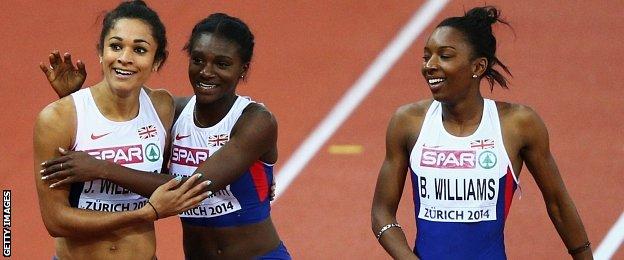 Silver medallist Jodie Williams is congratulated by Dina Asher-Smith and Bianca Williams