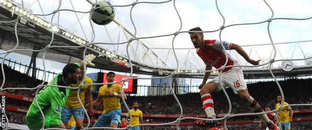 Arsenal's Aaron Ramsey scores