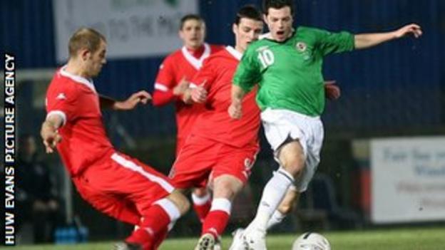 Steve Evans in action for Wales against Northern Ireland