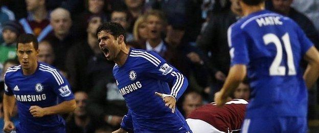 Diego Costa celebrates scoring on Chelsea debut