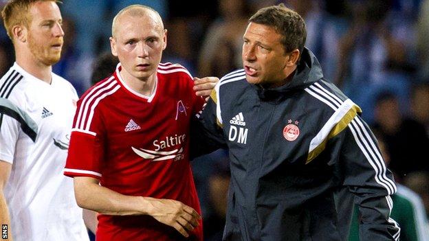 Willo Flood and Aberdeen manager Derek McInnes