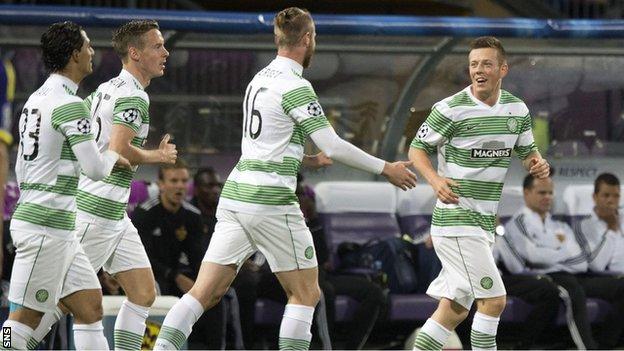Callum McGregor is congratulated on his goal for Celtic in Slovenia