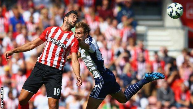 Graziano Pelle of Southampton and Craig Dawson of West Brom compete for the ball