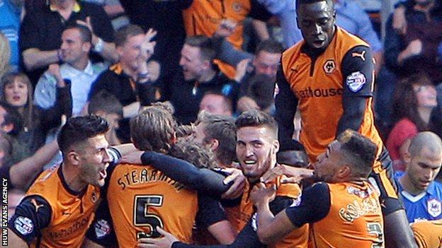 Wolves players celebrate as they beat Cardiff