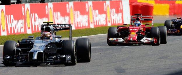 McLaren's Kevin Magnussen has been penalised for forcing Ferrari's Fernando Alonso