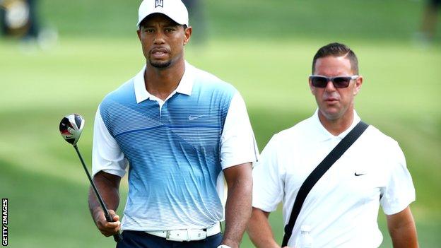Tiger Woods has worked with coach Sean Fley (left) since 2010