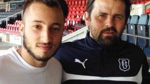 Dylan Carreiro with Dundee manager Paul Hartley