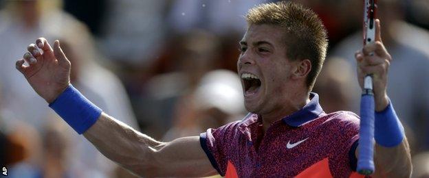Borna Coric celebrates after beating Lukas Rosol