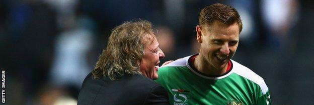 Pete Winkelman and MK Dons keeper David Martin