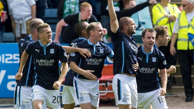 James McPake (third right) celebrates after giving Dundee the lead in the opening minute.