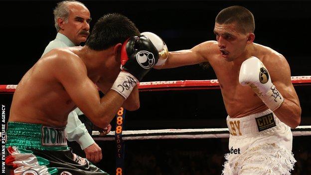 Lee Selby throws a right hand against Romulu Koasicha
