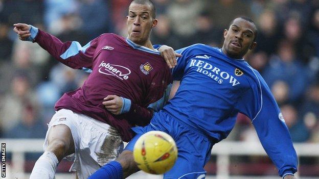 Danny Gabbidon has returned to Cardiff City as a first team player-coach on a one-year deal