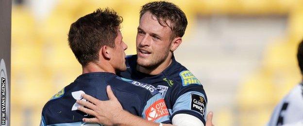 Lloyd Williams is congratulated by Cory Allen after scoring