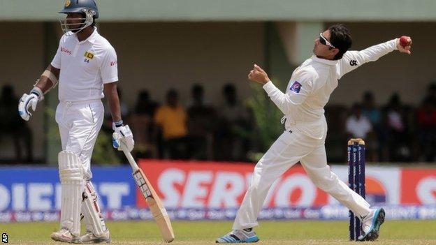 Pakistan's Saeed Ajmal bowling against Sri Lanka in August 2014