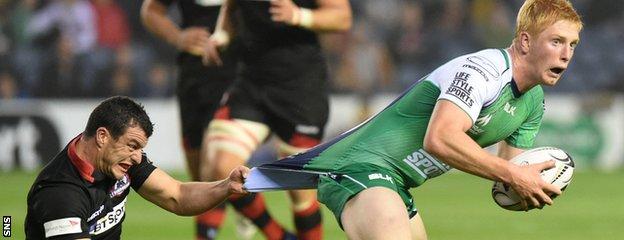 Connacht's Darragh Leader tries to break away from the Edinburgh defence