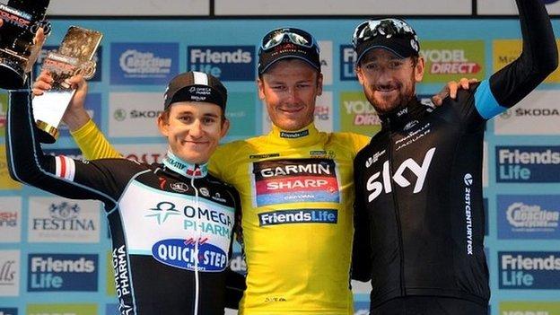 Dylan Van Baarle of Garmin-Sharp (centre) poses with second-placed Micha Kwiatkowskii of Omega Pharma-Quickstep (left) and third- placed Sir Bradley Wiggins of Team Sky (right)