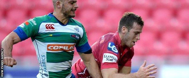 Gareth Davies prepares to touch down