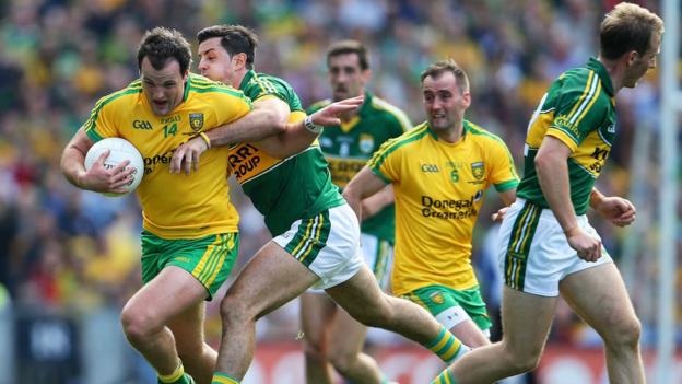 Donegal captain Michael Murphy is hauled back by Kerry defender Aidan O'Mahoney
