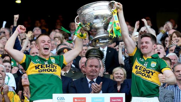 Fionn Fitzgerald and Kieran O'Leary lift the Sam Maguire Cup as Kerry celebrate a 37th All-Ireland title