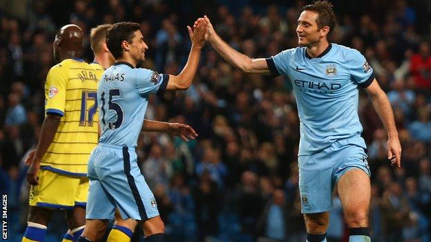 Frank Lampard and Jesus Navas celebrate Manchester City's win against Sheffield Wednesday
