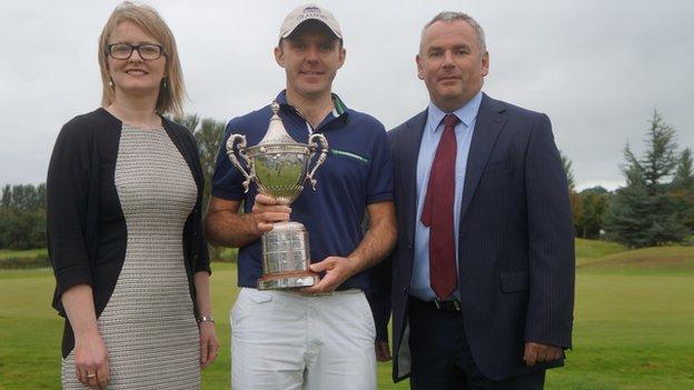 Ulster PGA Champion Colm Moriarty [centre] with Hilton Templepatrick manager Paula Collins and Adrian Byrne, managing director HBE Risk Management