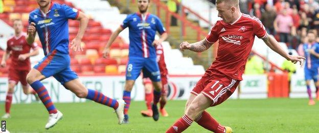 Jonny Hayes slots in the winner for Aberdeen