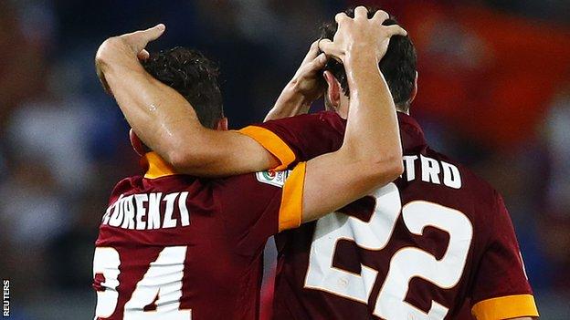 Roma's Destro and Florenzi celebrate Verona win