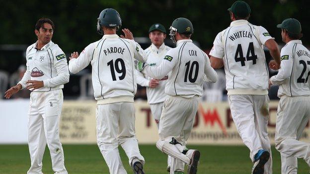 Worcestershire players celebrate another Saeed Ajmal wicket