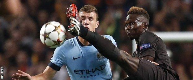 Mapou Yanga-Mbiwa challenges Edin Dzeko