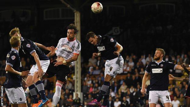 Fulham beat Bolton 4-0 to move above them in the Championship.
